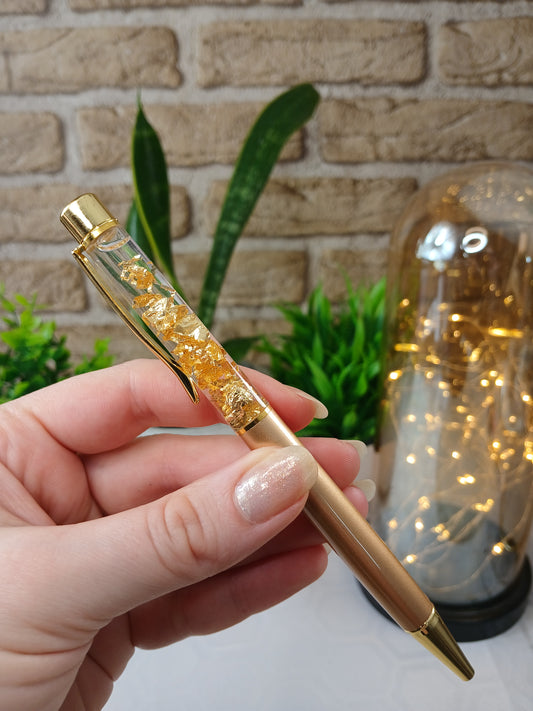 Kugelschreiber mit goldfarbenen Metallflocken