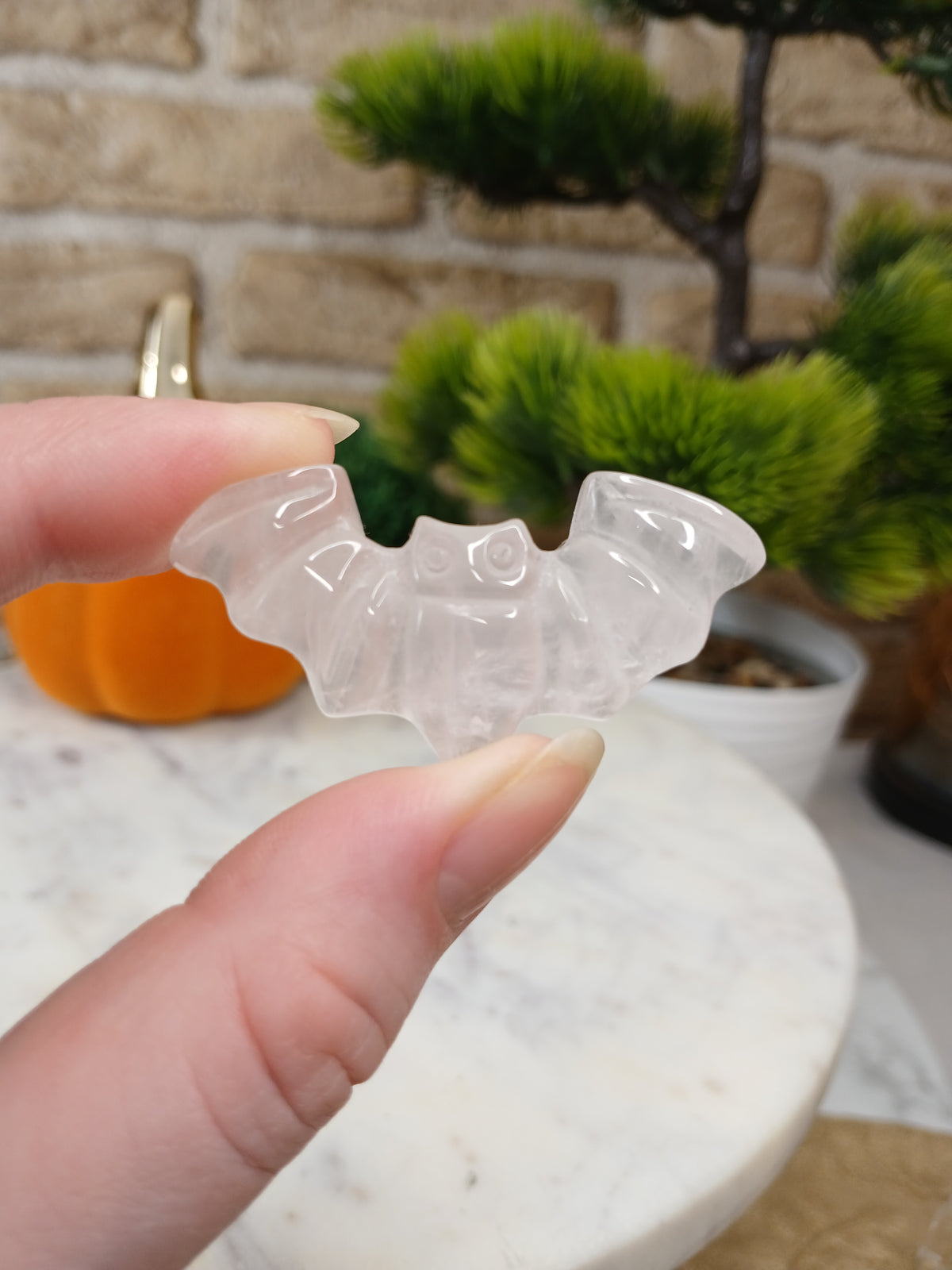 Klarer Quarz / Orangencalcit Fledermaus